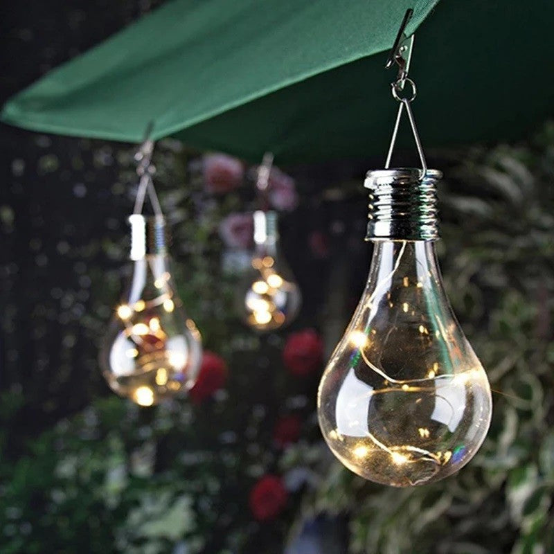 Lampa Solara LED Decorativă sub forma de Bulb, pentru exterior , suspendata, IP65, Bulb transparent , Lumina caldă