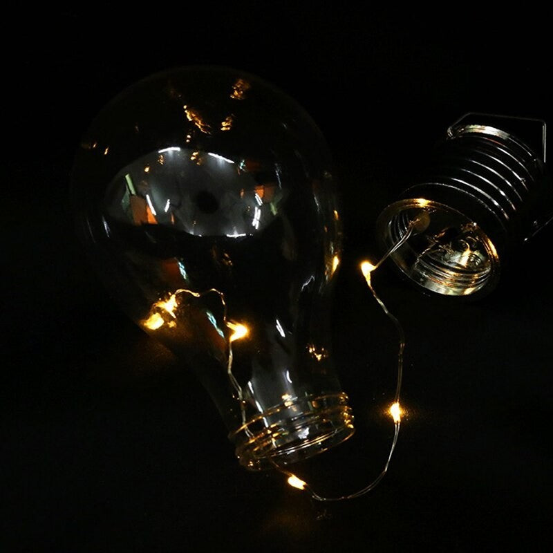 Lampa Solara LED Decorativă sub forma de Bulb, pentru exterior , suspendata, IP65, Bulb transparent , Lumina caldă