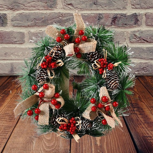 Coroniță pentru Crăciun decorată cu conuri, merișoare si 3 funde, 32cm
