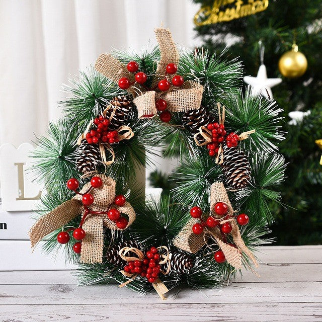 Coroniță pentru Crăciun decorată cu conuri, merișoare si 3 funde, 32cm
